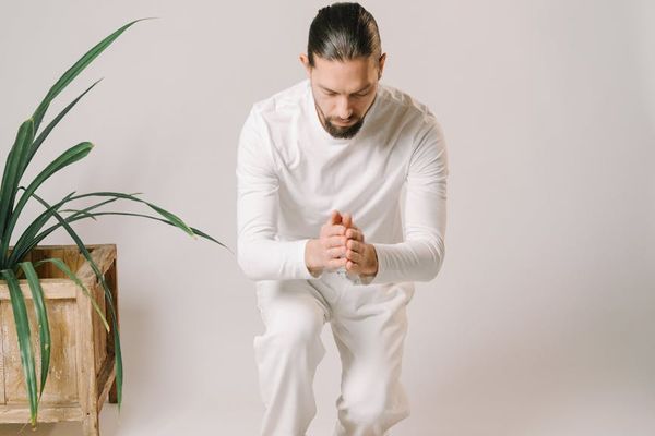A quiet corner with a yoga mat and a plant, signifying peace.