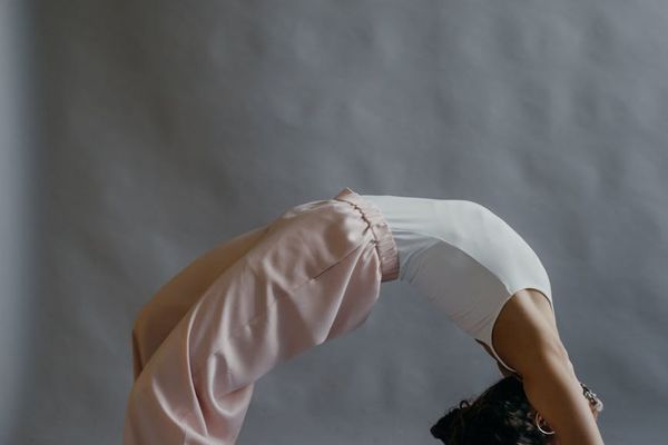 Person in a gentle stretching yoga pose.